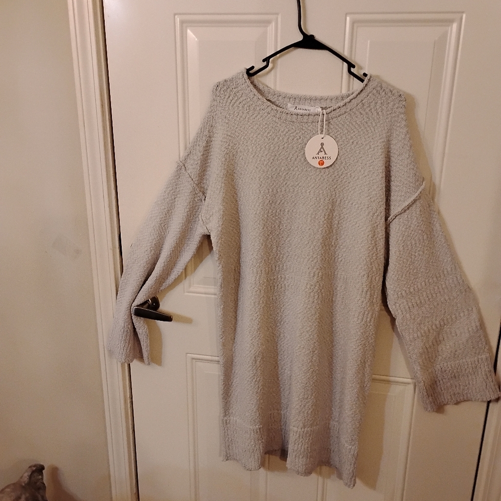 New With Tags Gray Sweater Dress..100% Polyester . Size Large.
